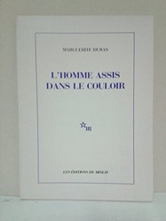 L' Homme Assis Dans Le Couloir