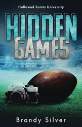 Hidden Games: Enemies-to-Lovers Football Romance Standalone (Hallowed Saints University)